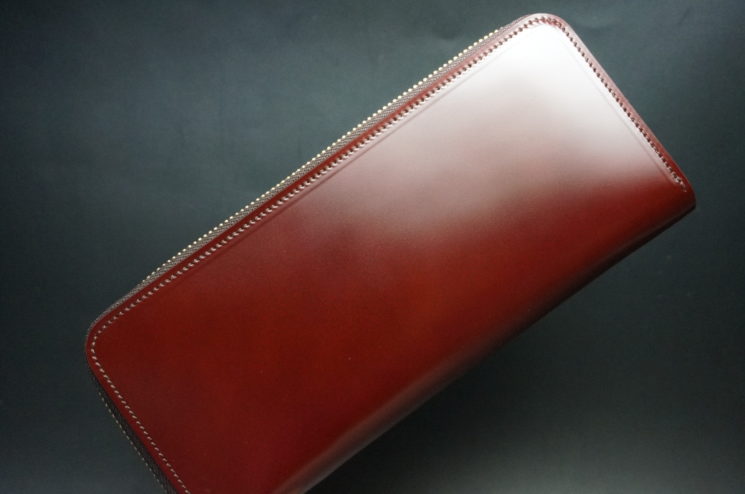新喜皮革社の顔料仕上げコードバンのアンティークカラーのラウンドファスナー長財布の画像1