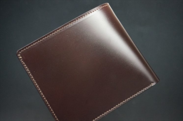 新喜皮革社製顔料仕上げコードバンのダークブラウン色の二つ折り財布（ゴールド色）-1-1