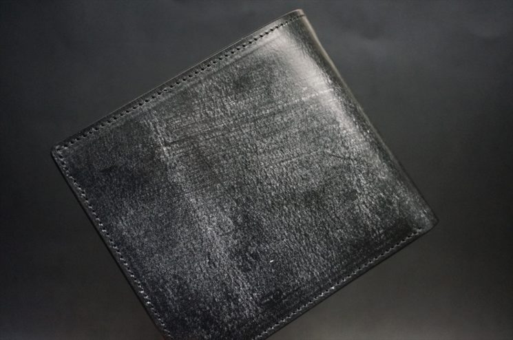 J.ベイカー社製ブライドルレザーのブラック色の二つ折り財布